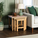 Surrey Oak Nest of Tables in living room setting from Roseland Furniture