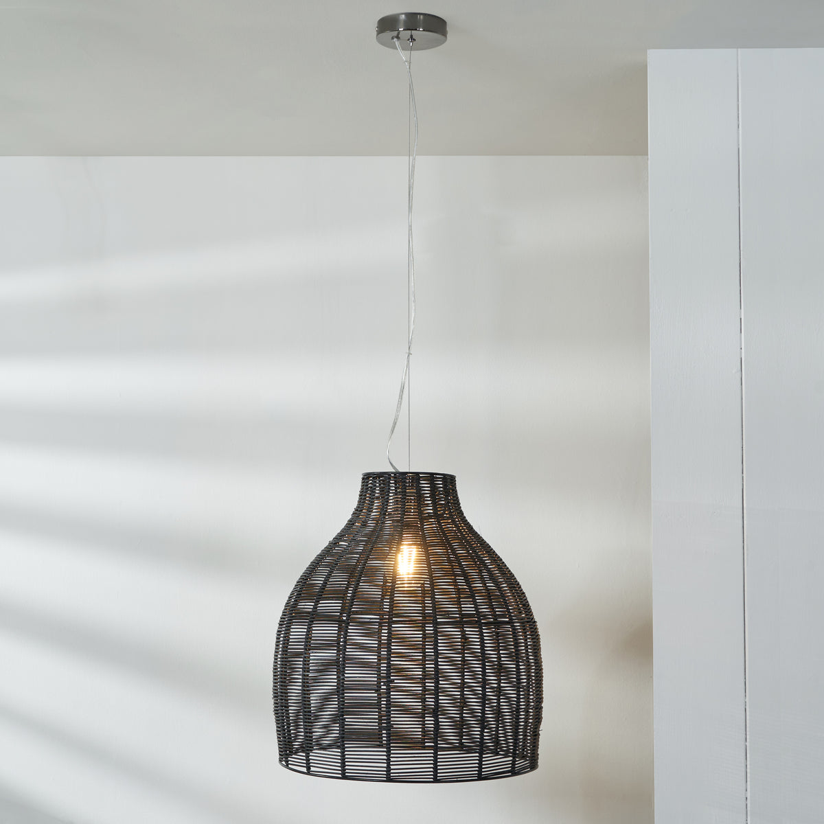 Caswell Black Rattan Coche Pendant for living room