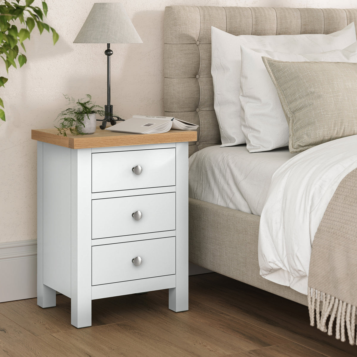 Farrow White Bedside Table from Roseland Furniture - Lifestyle shot