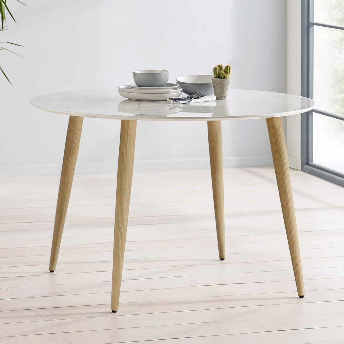 Erika 120cm White Faux Marble Round Dining Table from Roseland Furniture