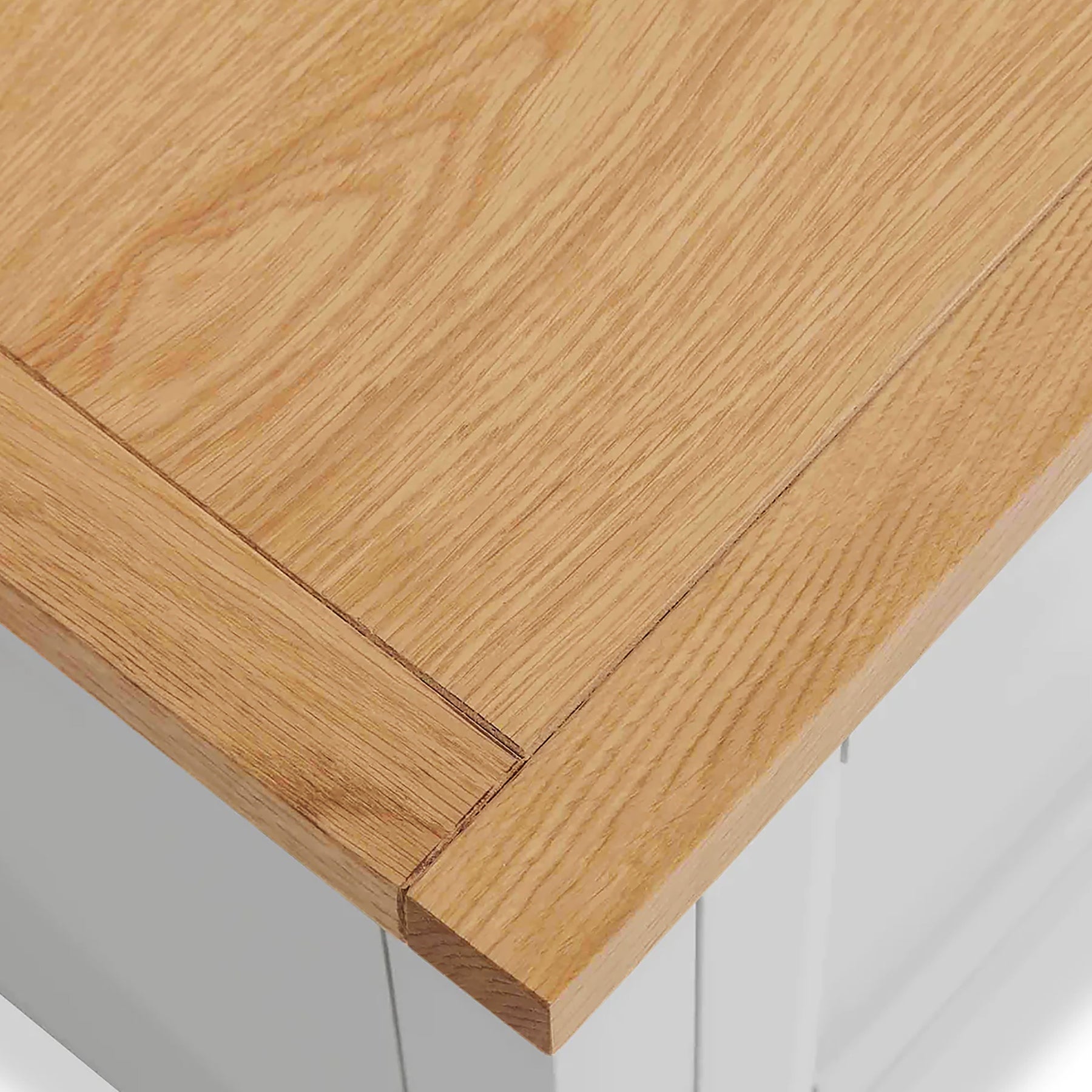 Farrow XL Grey 2 Over 3 Chest Of Drawers from Roseland Furniture - close up of wooden top