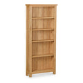 Tall, light oak bookcase with five shelves.
