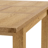 Lanner Oak Compact Extending Dining Table from Roseland Furniture