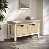 Farrow Basket Storage Bench from Roseland Furniture decorated with a book in a hallway