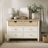 Farrow Basket 6 Drawer Chest from Roseland Furniture decorated with books pictures and vases in a room