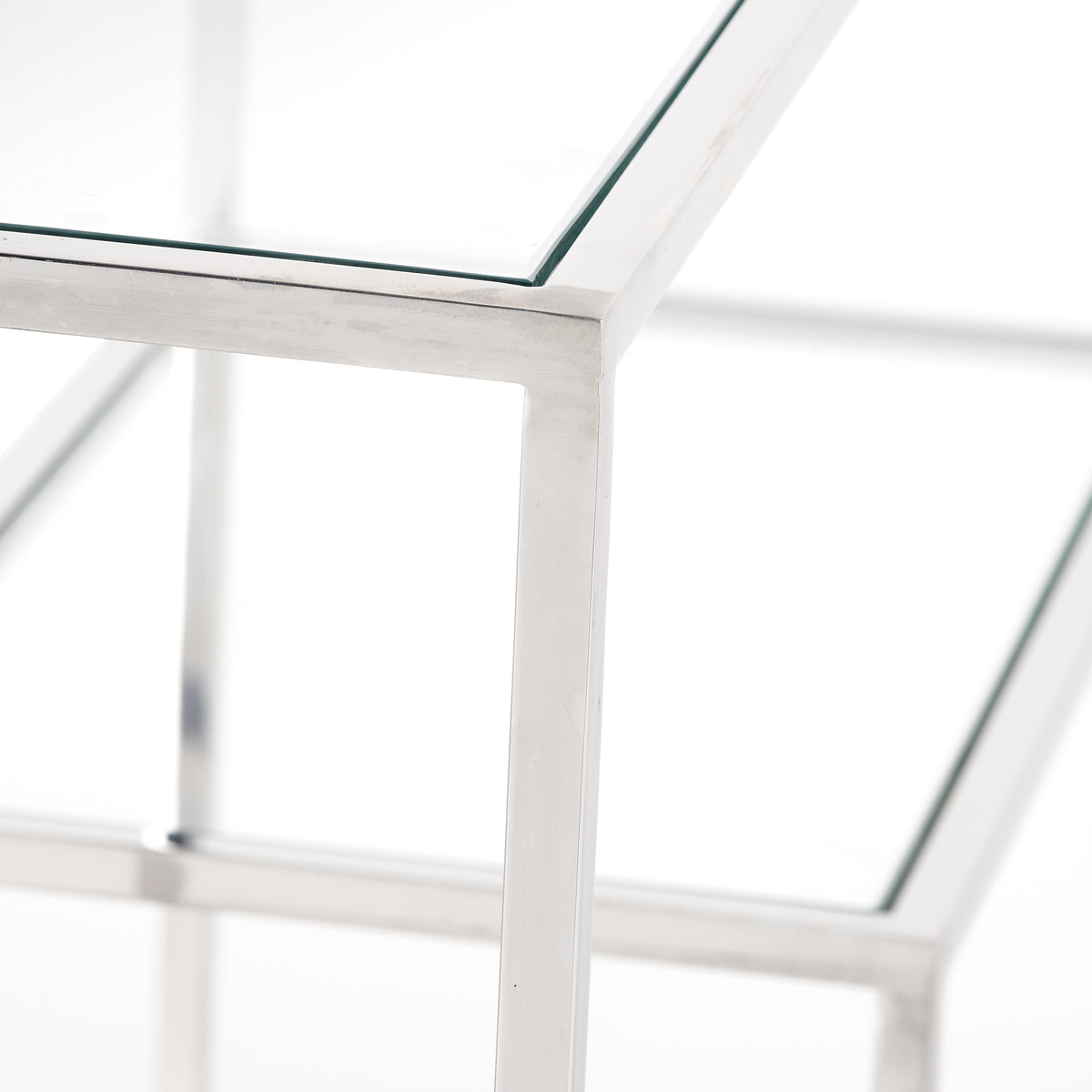 Aleandra Clear Glass and Silver Metal Console Table from Roseland Furniture