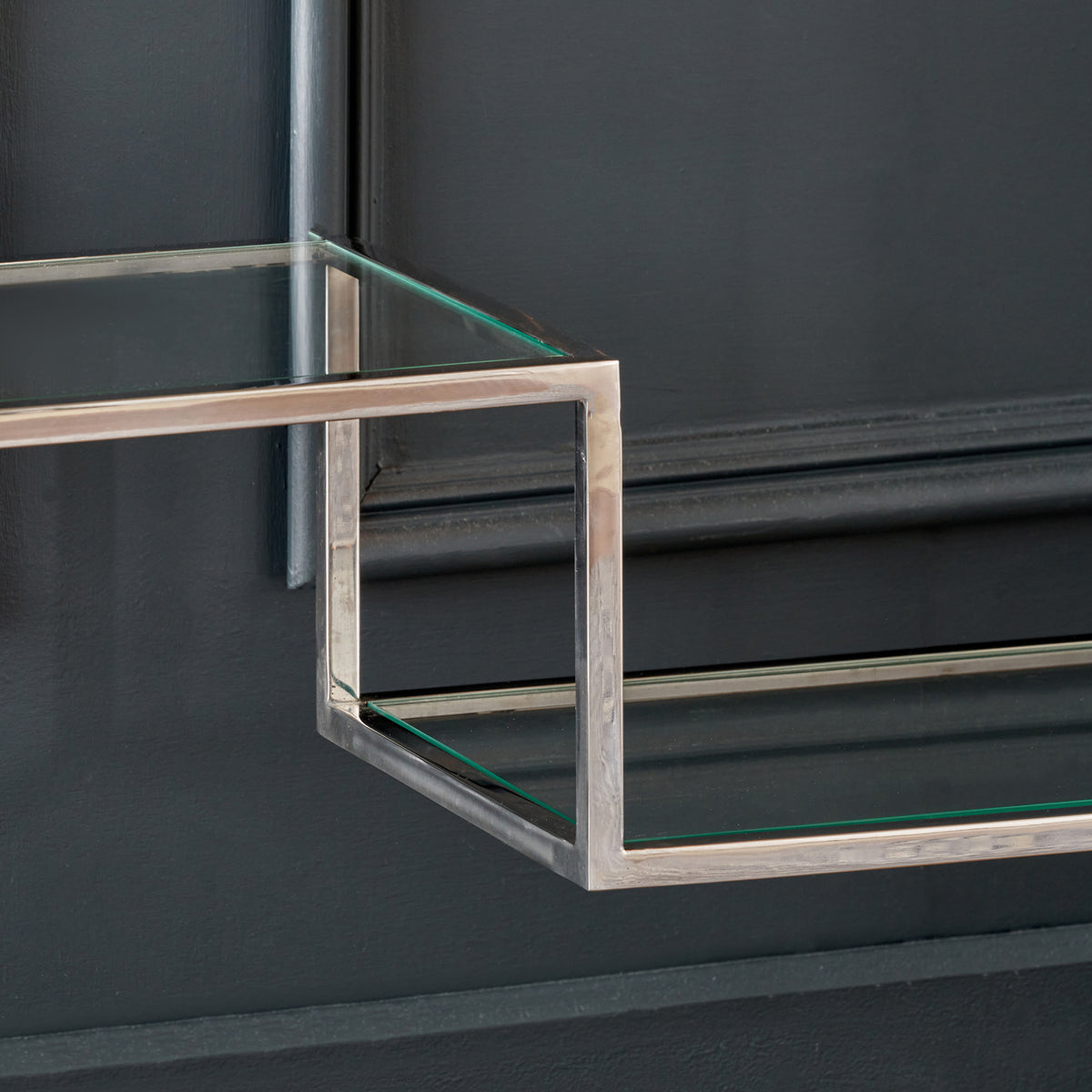 Aleandra Clear Glass and Silver Metal Console Table from Roseland Furniture