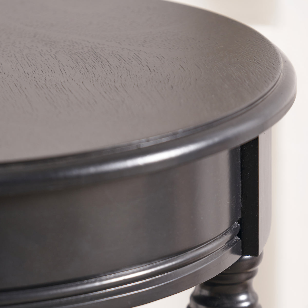 Heritage Black Pine Wood Round Accent Table from Roseland Furniture