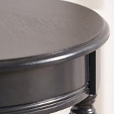 Heritage Black Pine Wood Round Accent Table from Roseland Furniture