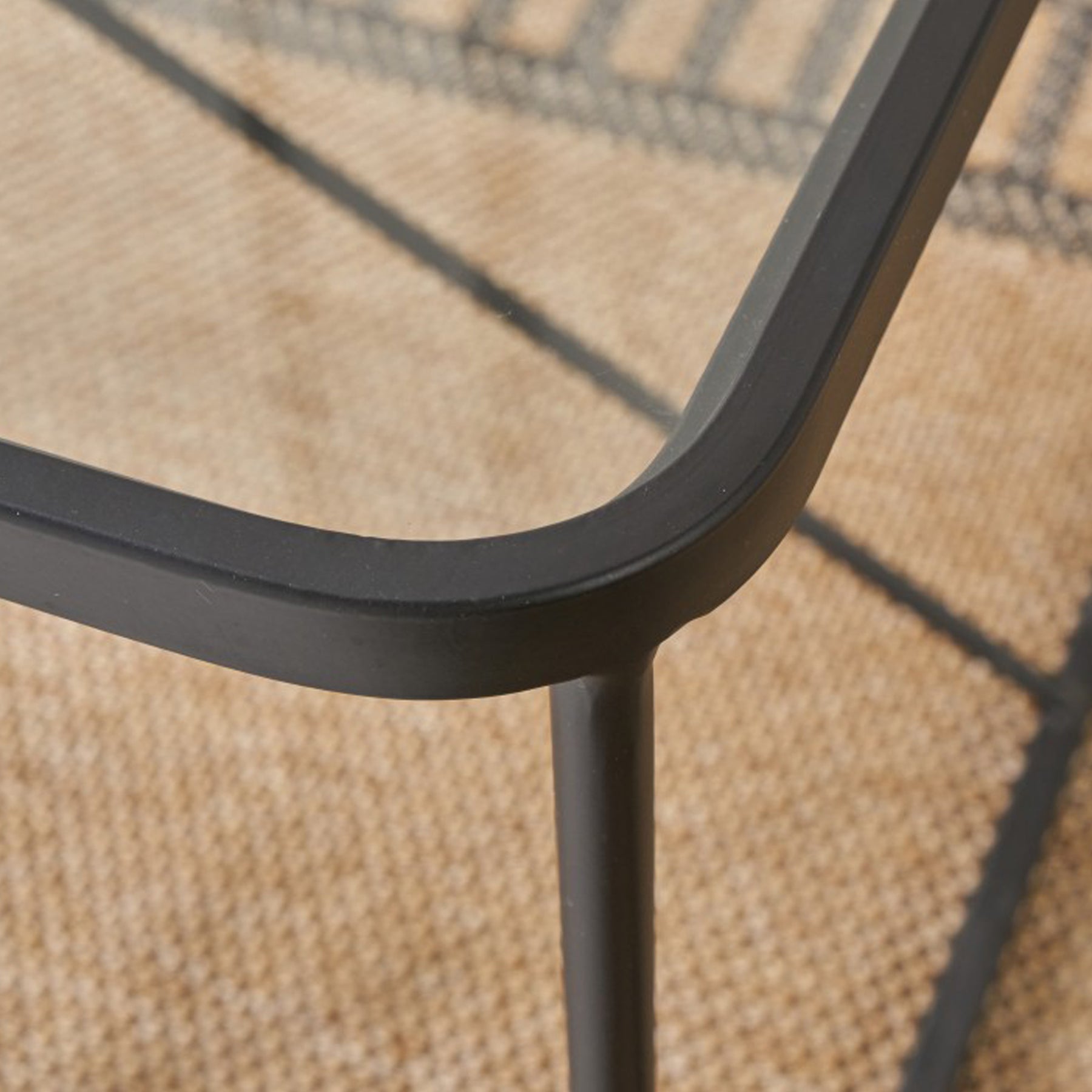 Roxy Glass and Black Metal Coffee Table from Roseland Furniture