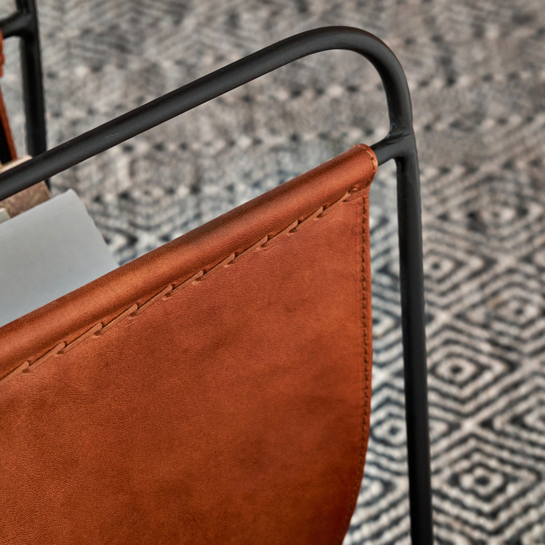 Eliseo Leather Magazine Rack Brown from Roseland Furniture