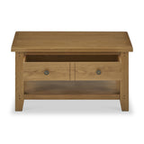 Wooden coffee table with two drawers and a lower shelf, isolated on a white background.