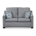 Charlcote Silver Faux Linen 2 Seater Sofabed with Blue Scatter Cushions from Roseland Furniture