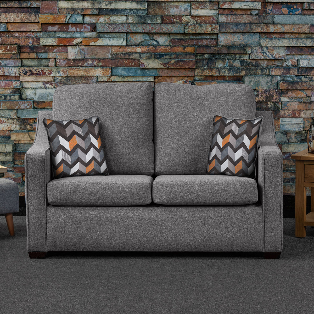 Fenton Charcoal Soft Weave 2 Seater Sofabed with Charcoal Scatter Cushions from Roseland Furniture