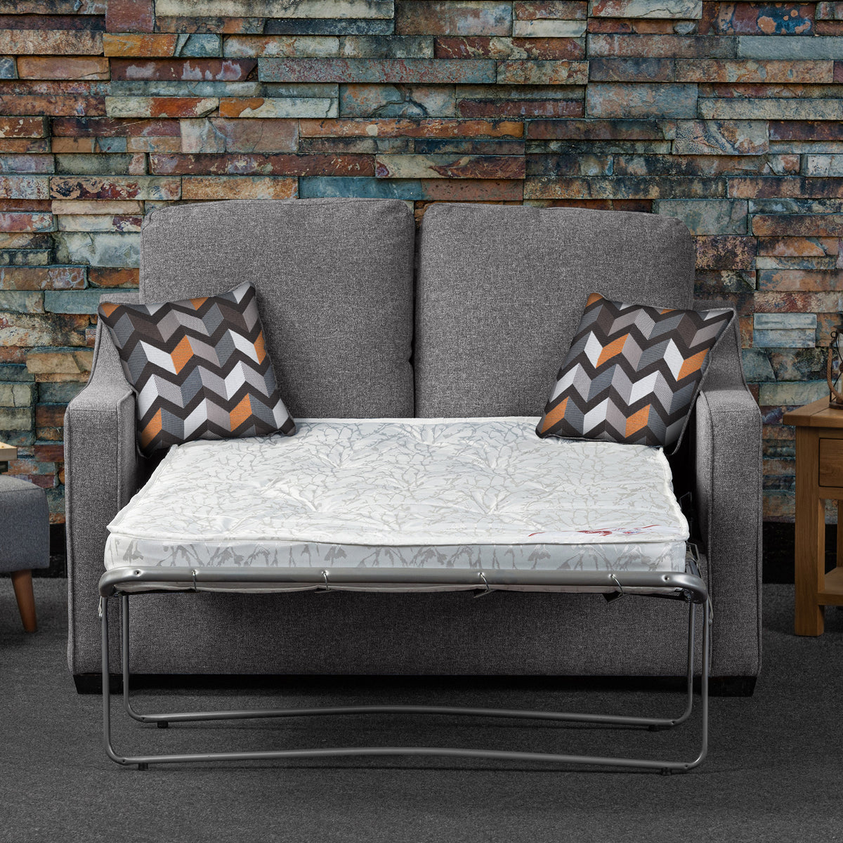 Fenton Charcoal Soft Weave 2 Seater Sofabed with Charcoal Scatter Cushions from Roseland Furniture