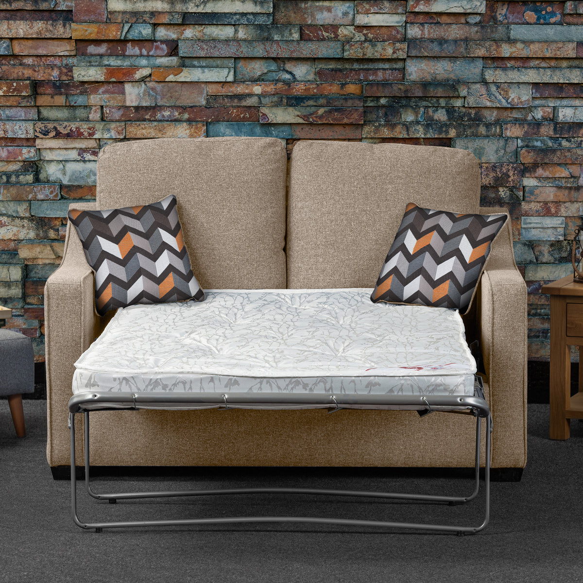 Fenton Fawn Soft Weave 2 Seater Sofabed with Charcoal Scatter Cushions from Roseland Furniture