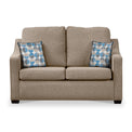 Fenton Fawn Soft Weave 2 Seater Sofabed with Blue Scatter Cushions from Roseland Furniture