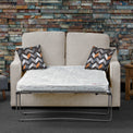 Fenton Oatmeal Soft Weave 2 Seater Sofabed with Charcoal Scatter Cushions from Roseland Furniture