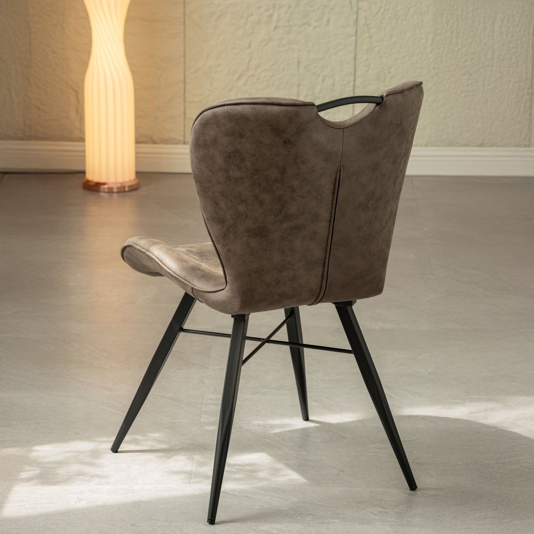 Peran Brown Soft Faux Leather Dining Chair from Roseland Furniture