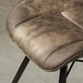 Peran Brown Soft Faux Leather Dining Chair from Roseland Furniture