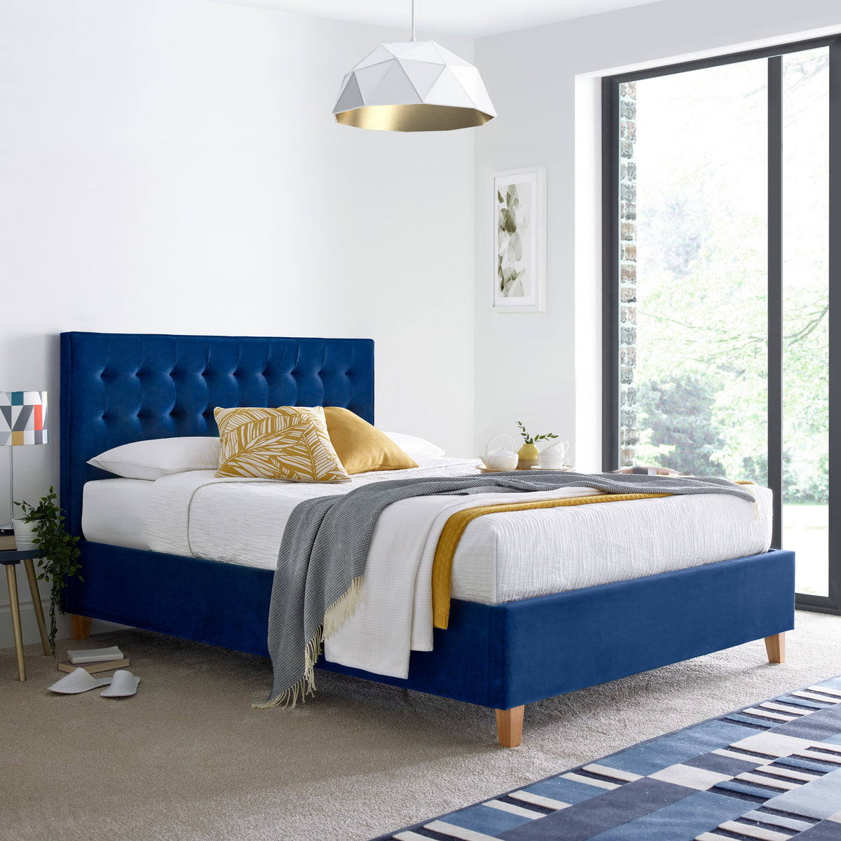 Kia Blue Velvet Ottoman Bed from Roseland Furniture