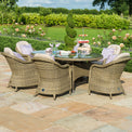 Maze Winchester 6 Seat Outdoor Oval Rattan Dining Set with Lazy Susan from Roseland Furniture