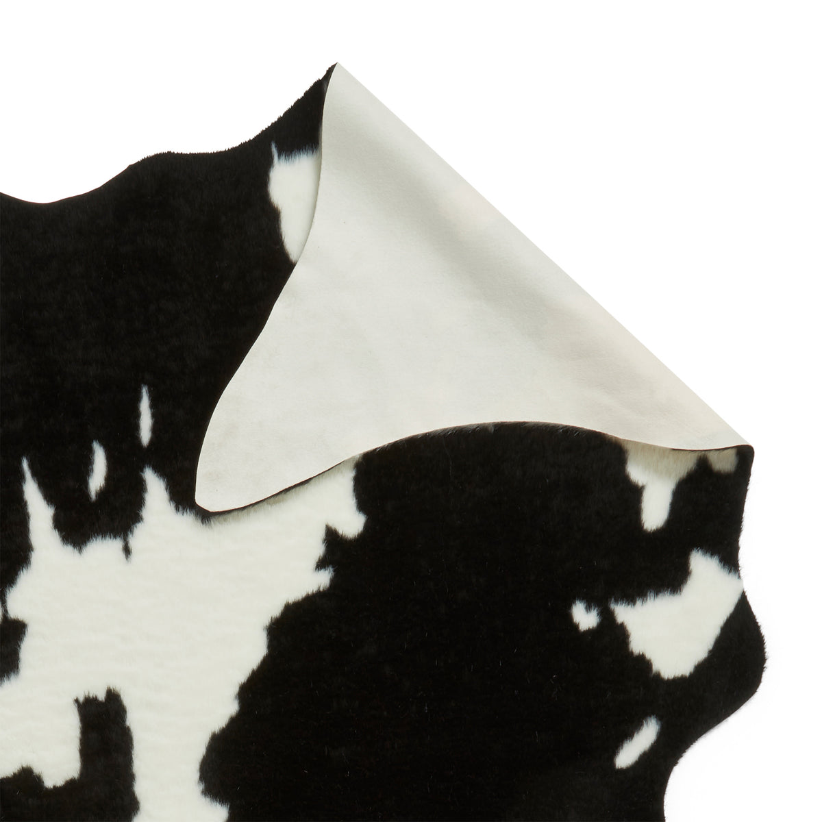 Bellaire Faux Cow Print Rug Black White from Roseland Furniture