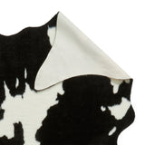 Bellaire Faux Cow Print Rug Black White from Roseland Furniture