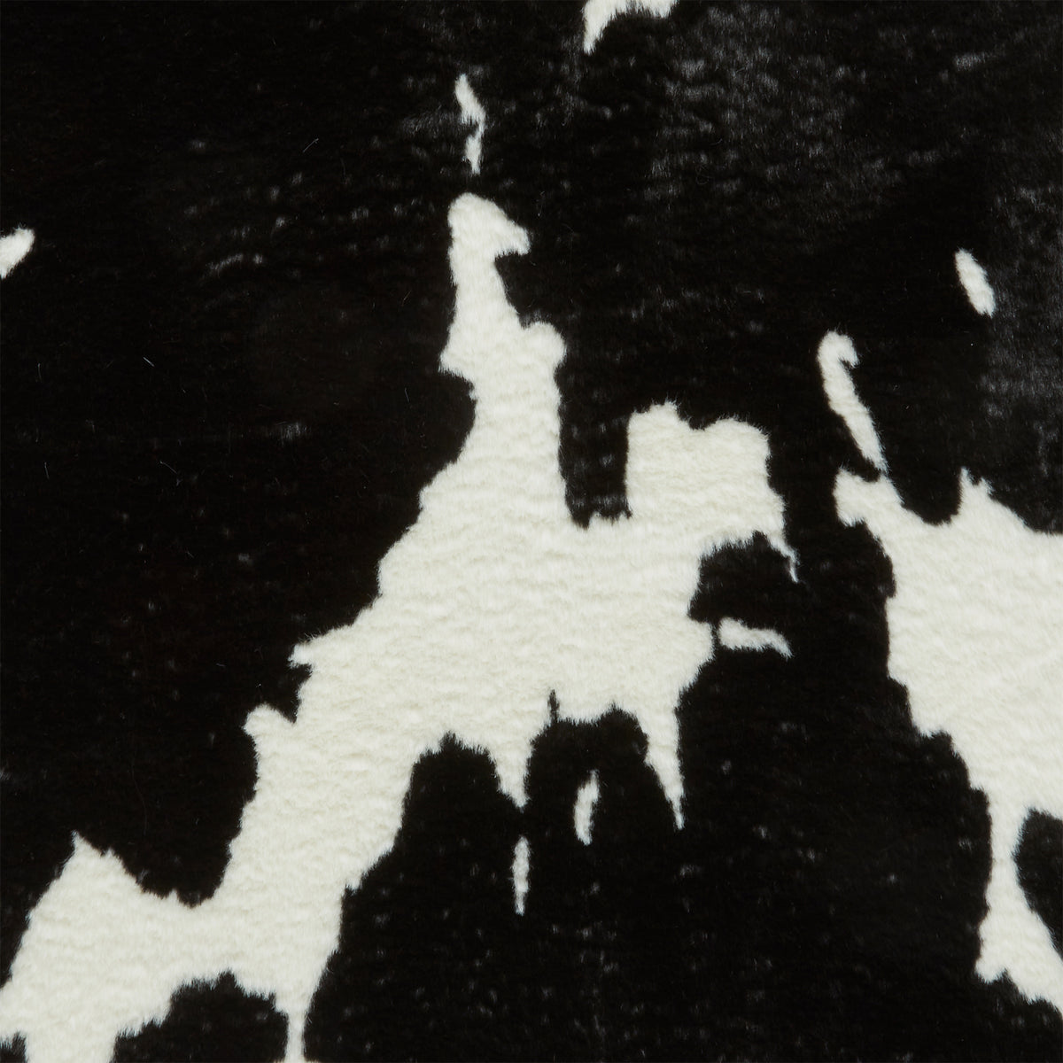 Bellaire Faux Cow Print Rug Black White from Roseland Furniture