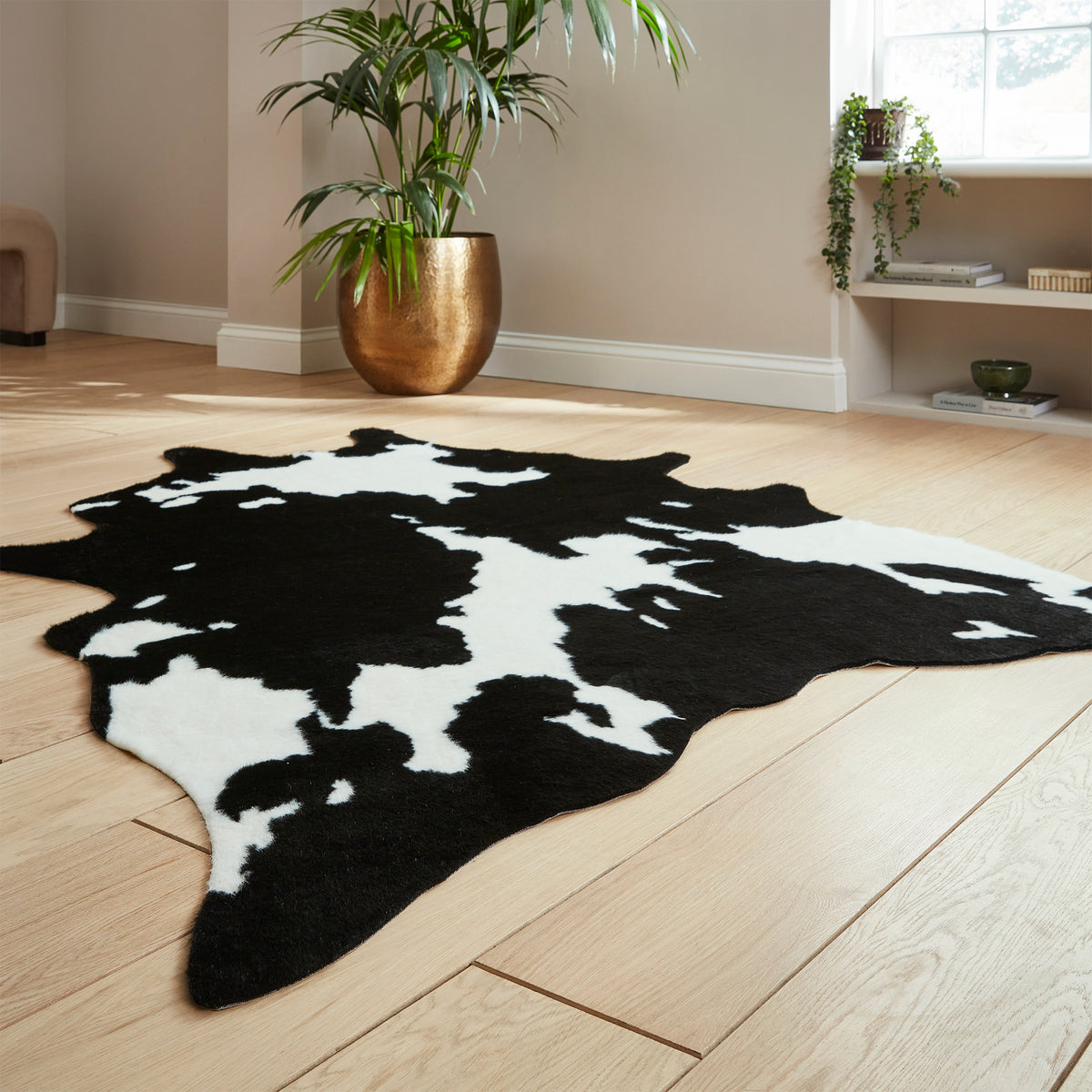 Bellaire Faux Cow Print Rug Black White from Roseland Furniture