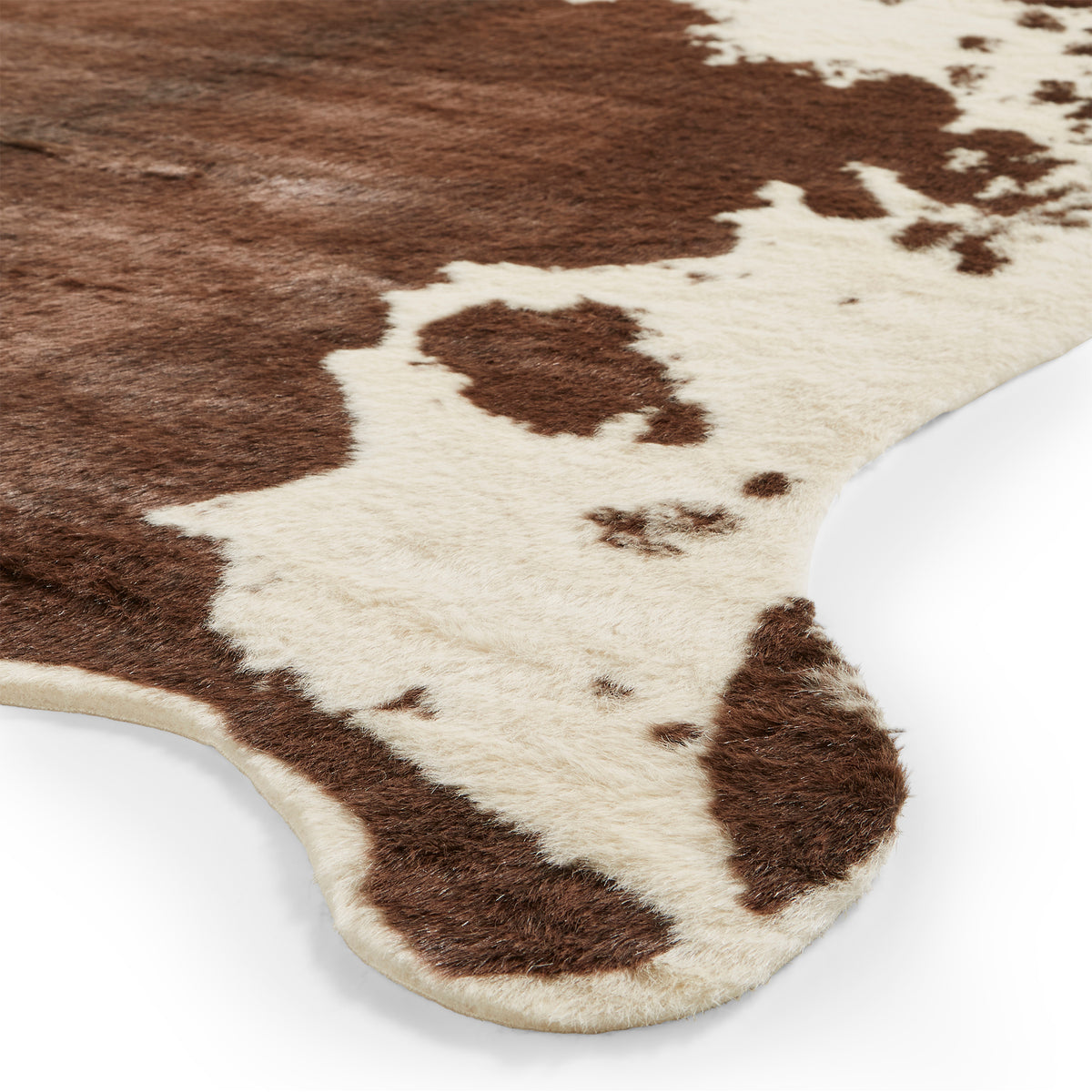 Alamo Faux Cow Print Rug Brown White from Roseland Furniture