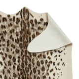 Kadune Faux Fur Leopard Print Rug Brown White from Roseland Furniture