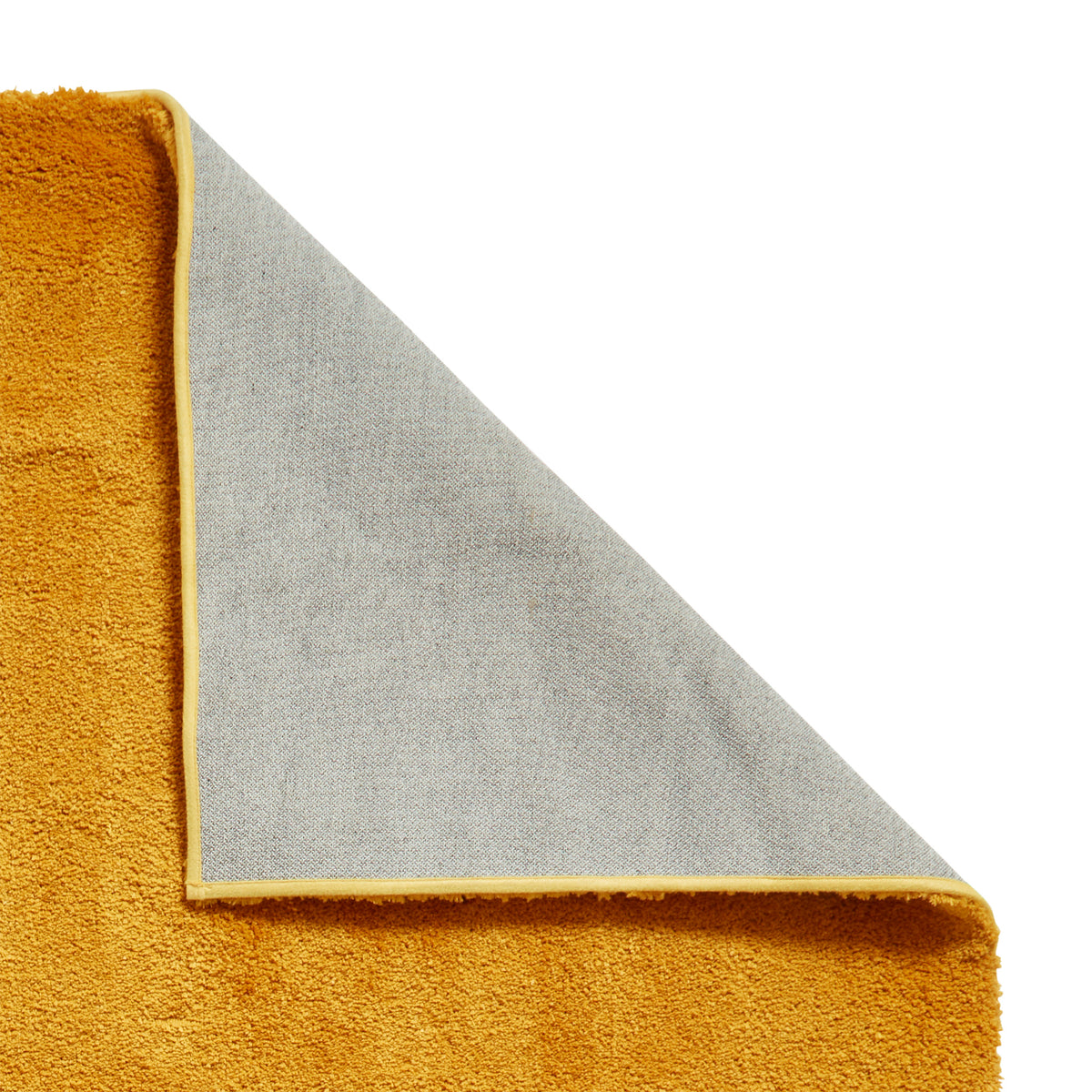 Mackenzie Washable Shaggy Rug Ochre from Roseland Furniture