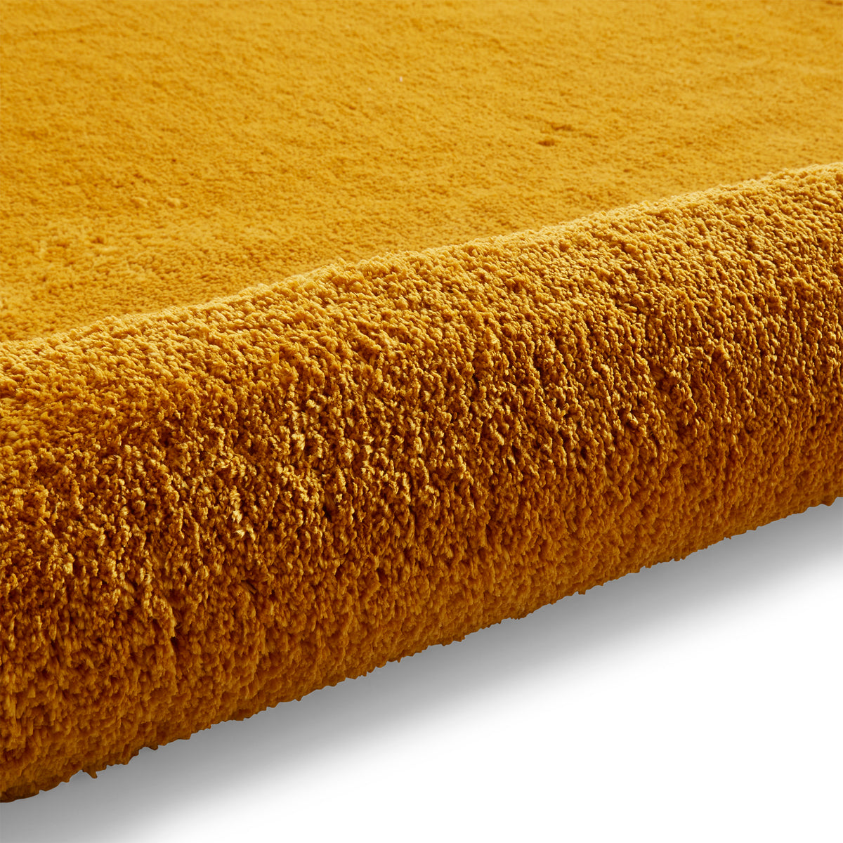 Mackenzie Washable Shaggy Rug Ochre from Roseland Furniture