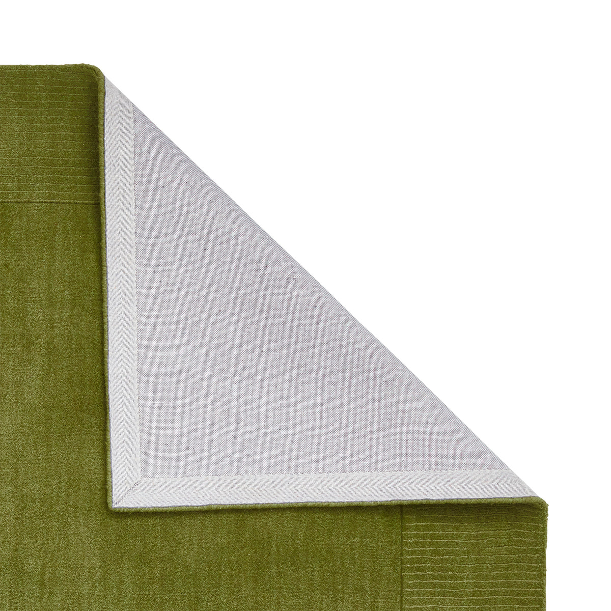 Lauder Plain Wool Border Rug Green from Roseland Furniture