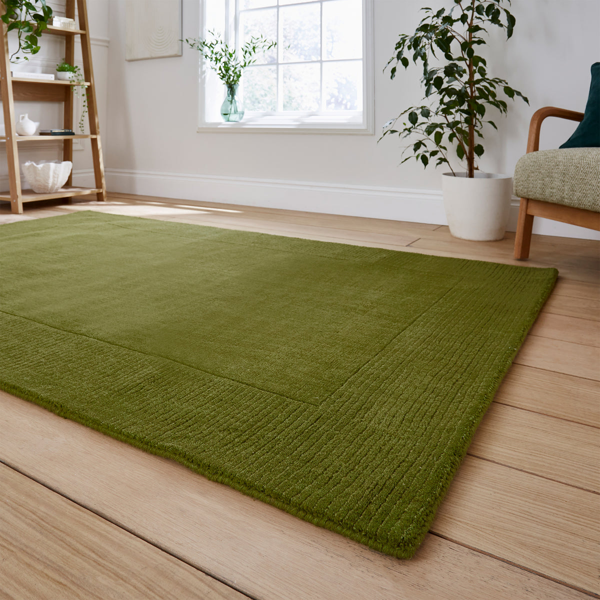 Lauder Plain Wool Border Rug Green from Roseland Furniture