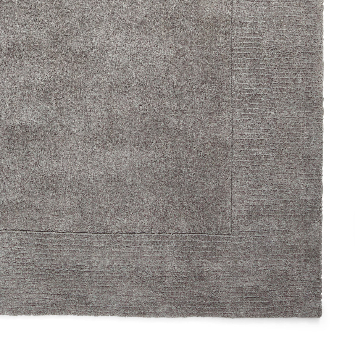 Lauder Plain Wool Border Rug Grey from Roseland Furniture
