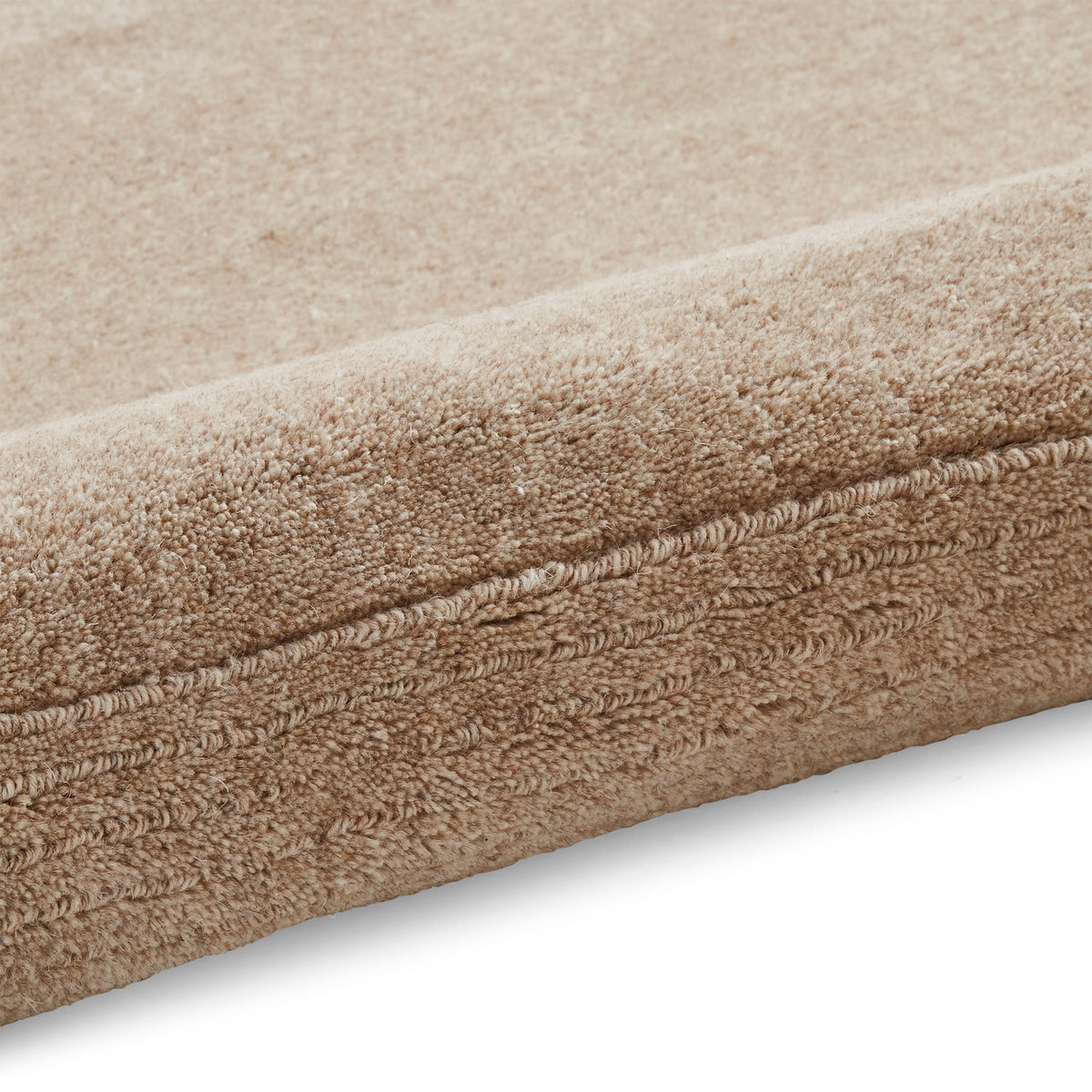 Lauder Plain Wool Border Rug Natural from Roseland Furniture