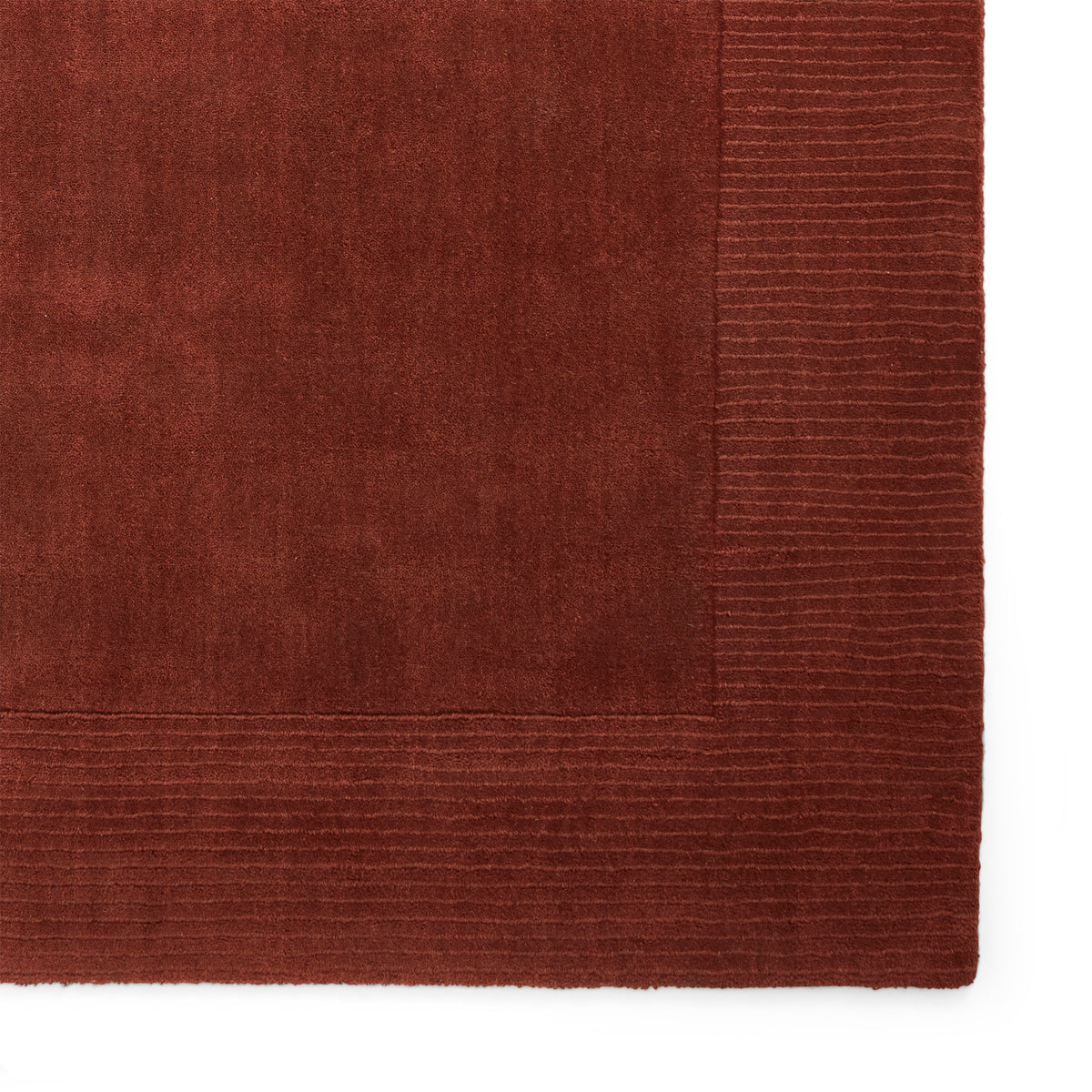 Lauder Plain Wool Border Rug Red from Roseland Furniture