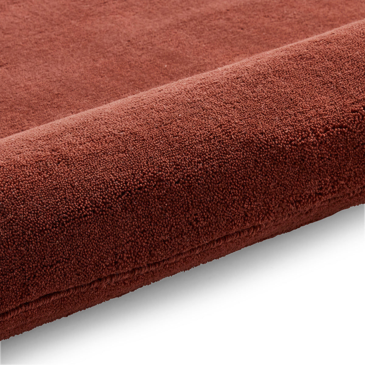 Lauder Plain Wool Border Rug Red from Roseland Furniture