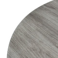 Louie-grey-oak-effect-round-dining-table from Roseland Furniture