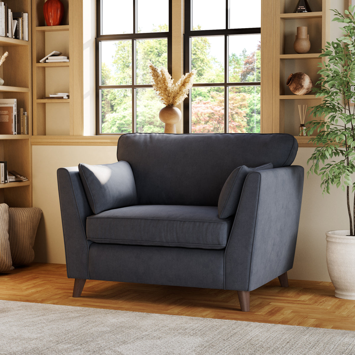 Osten Snuggler Armchair Navy from Roseland Furniture