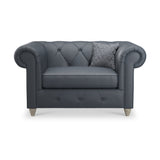 Everett Leather Snuggle Chair Navy Washed Feet from Roseland Furniture