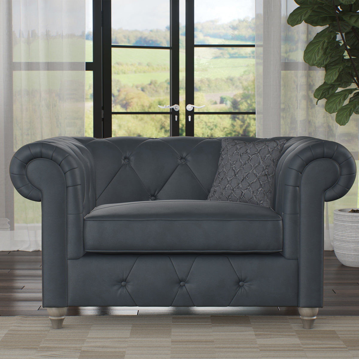 Everett Leather Snuggle Chair Navy Washed Feet from Roseland Furniture