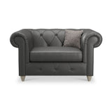 Everett Leather Snuggle Chair Raven Washed Feet from Roseland Furniture