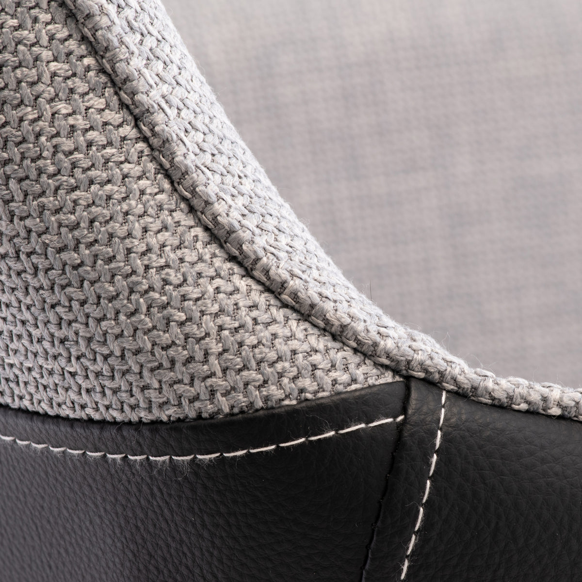 Halvard-Faux-Leather-Dining-Armchair-Black-Silver from Roseland Furniture