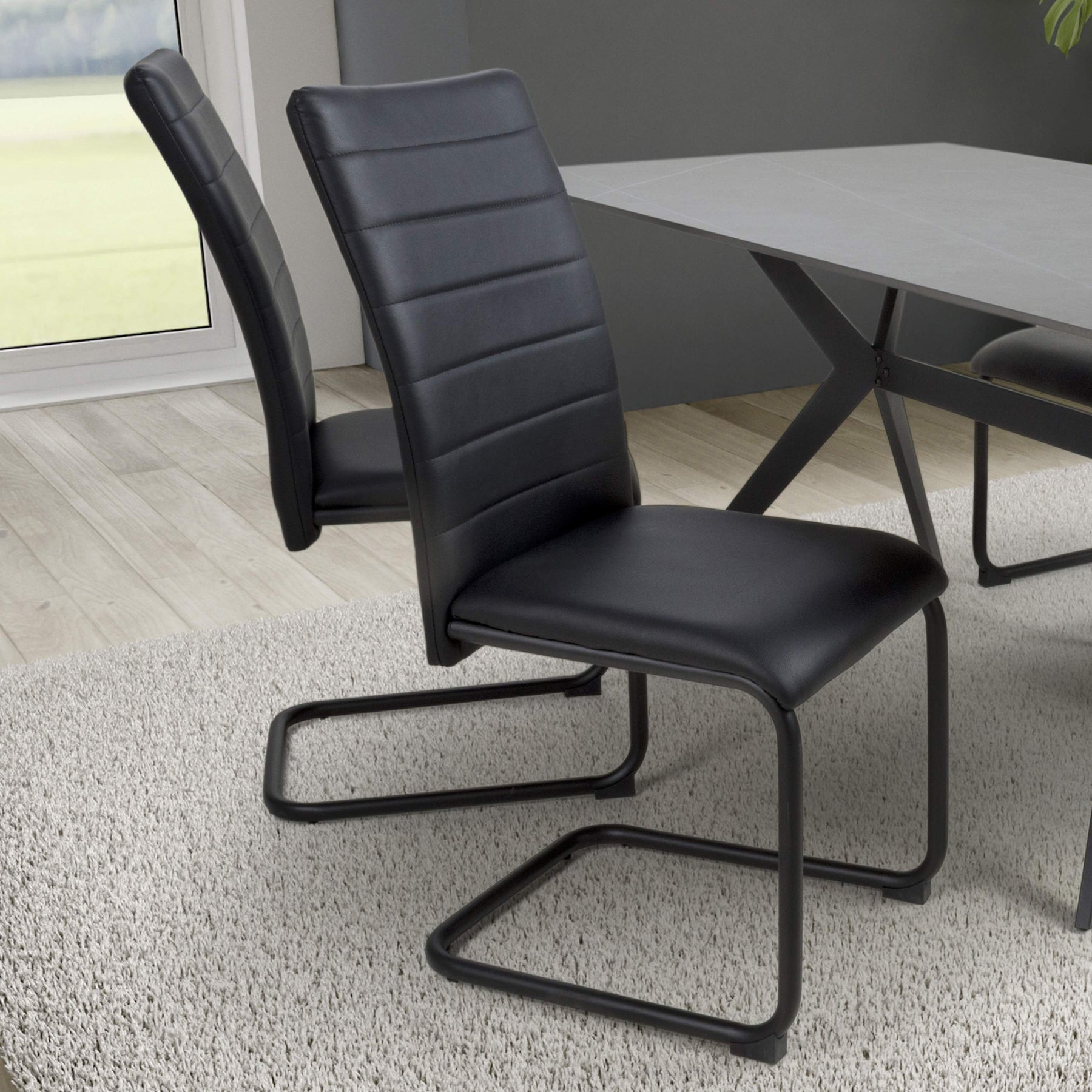 Aeron Faux Leather Dining Chair Black from Roseland Furniture