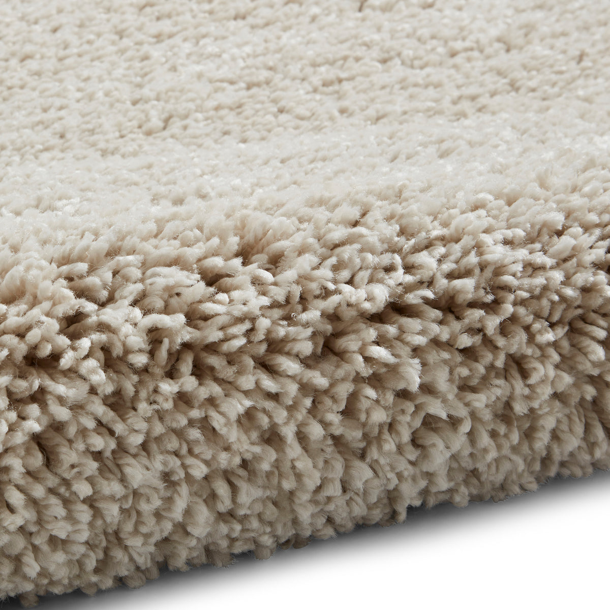 Roswell Cream Stain Resistant Shaggy Rug 