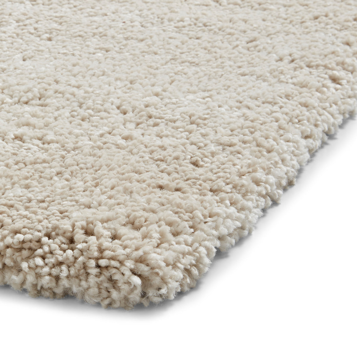 Roswell Cream Stain Resistant Shaggy Rug 