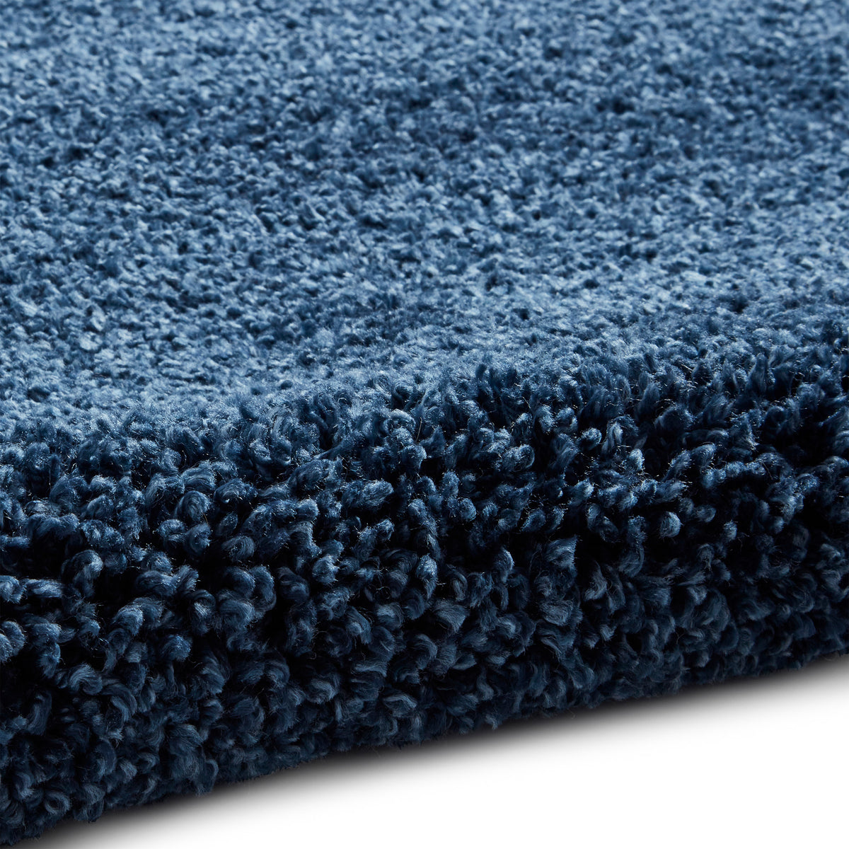 Roswell Dark Blue Stain Resistant Shaggy Rug 